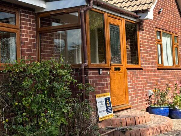 5 star sign on Extreme UPVC Light oak windows and doors-inner