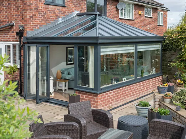 A modern grey solid roof conservatory