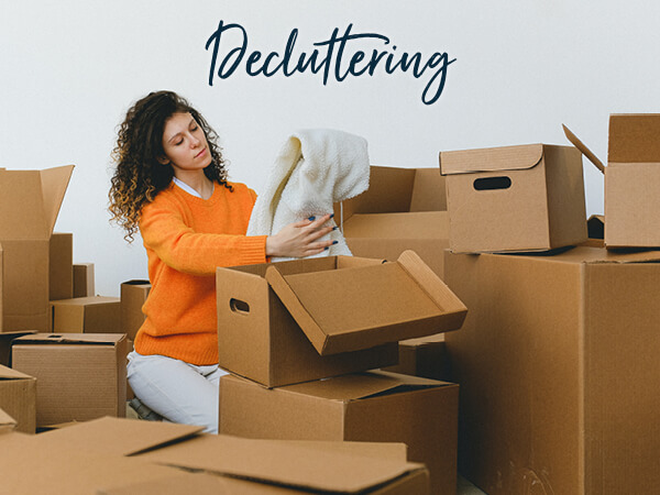 A woman decluttering a house