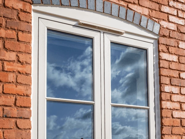 Trickle vents in a Flush casement, wooden looking UPVC window