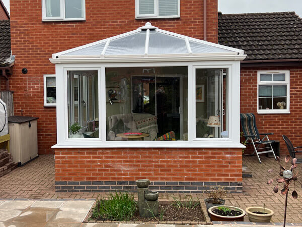 Edwardian conservatory with sliding patio door in Hereford