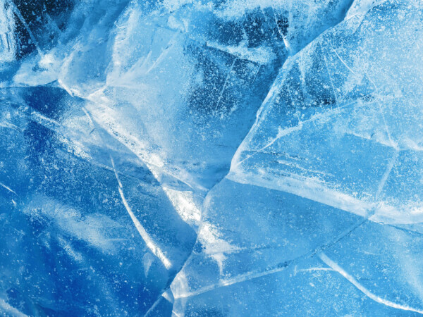 Blue frozen water cracked ice