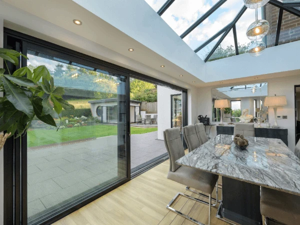 Origin OS 20 doors with 20mm sightline under a Ultraframe Ultra Sky Lantern Roof