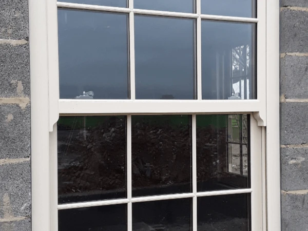 Roseview Charisma sash window into block in cream