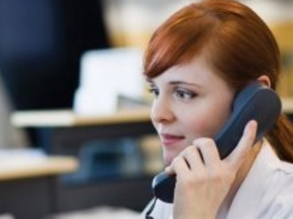 Service Receptionist taking customer call