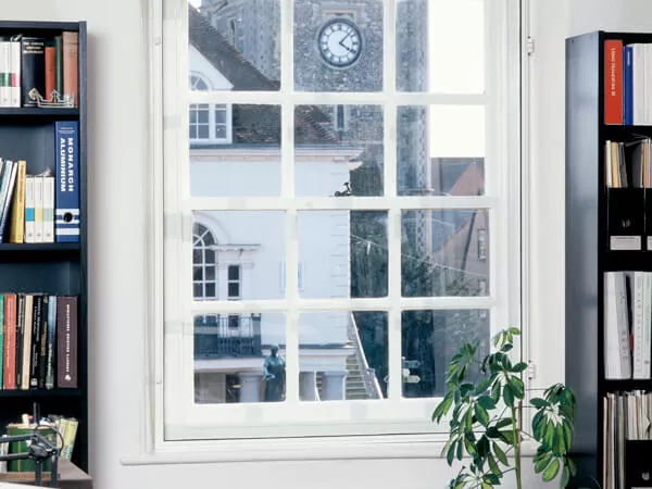 Side Hung Secondary Glazing fitted to white window