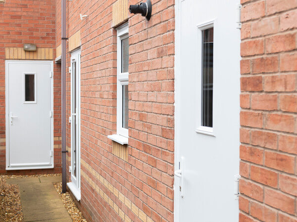 Two white composite doors