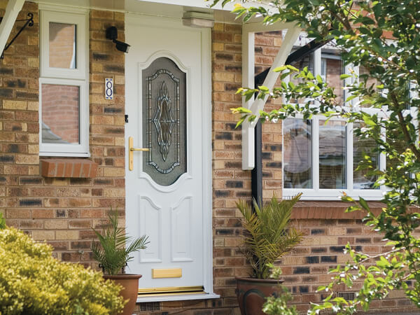 White UPVC Door with gold furniture