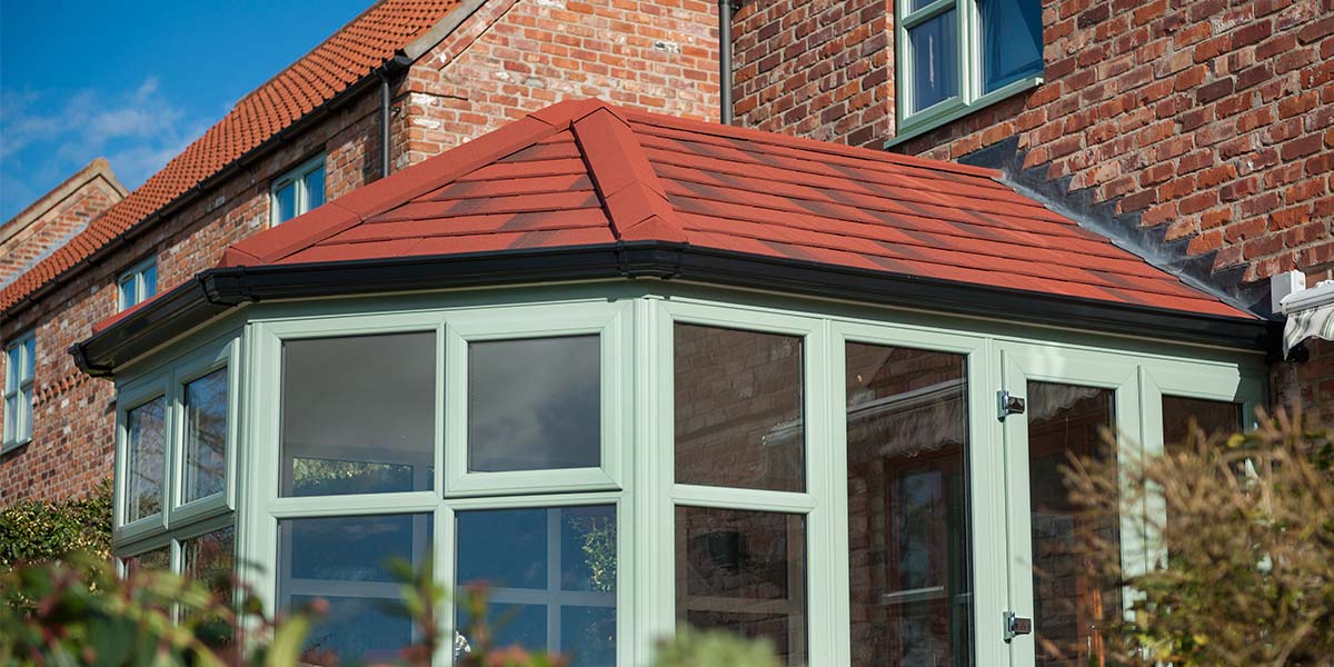 Victorian Conservatory With A Red Solid Tiled Roof