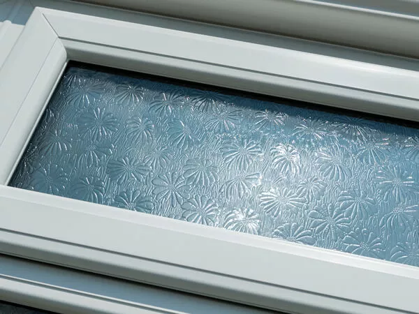 Privacy Glazing in white window with daisy pattern