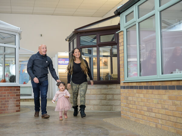 A Couple With Young Child Visiting 5 Star'S Worcester Showroom